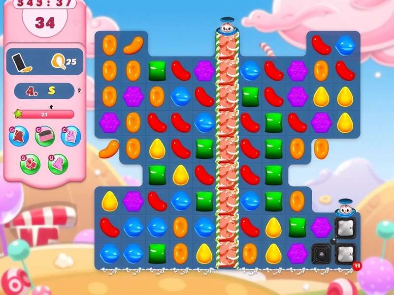 Candy Crush Saga gameplay screenshot showing colorful candies and boosters